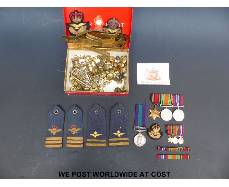 A set of WWII and later medals comprising 1939-1945 medal, Defence medal, Burma Star and Elizabeth II General Service medal w