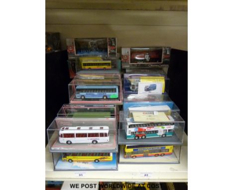 Thirty-four Corgi Original Omnibus Company (OOC) diecast model buses, coaches and trams, all in original boxes, some with out