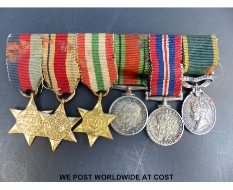 A miniature set of six WW2 medals comprising Territorial Efficient Service Medal, 1939-1945 Defence medal, Italy Star, Africa