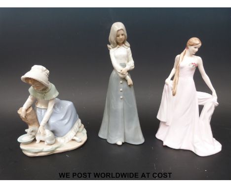 A Coalport figurine 'Fair Isabel', together with a Nao figure and one other