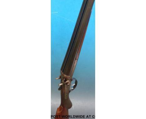 Unnamed 12 bore side by side double barrelled hammer action shotgun with engraving to the locks, trigger guard and hammers, c
