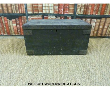 A metal bound wooden strongbox/ travelling trunk with candle box (W61 D50 H51)