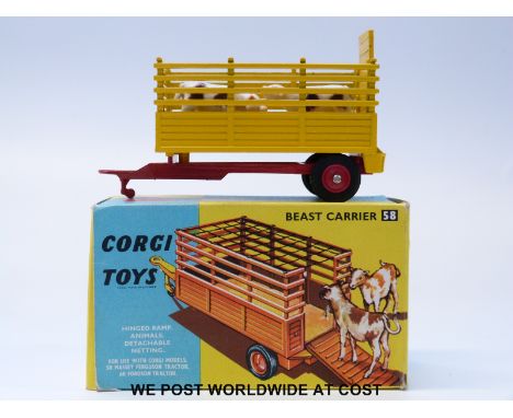 Corgi Toys diecast model Beast Carrier, 58, with yellow body, red chassis and hubs, four calves, cardboard hay and green nett