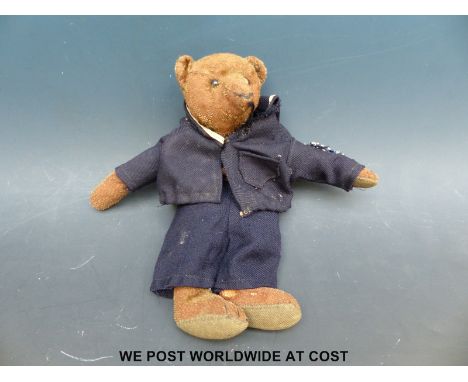 A Steiff mohair bear dressed in a sailor's uniform (30cm tall)