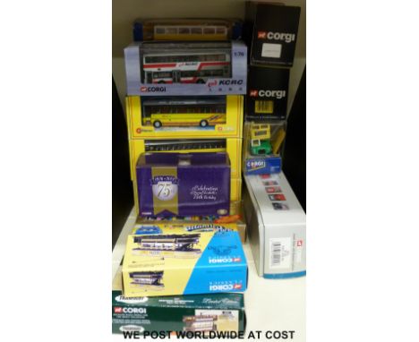 Seventeen Corgi diecast model buses, coaches and trams, all in original boxes