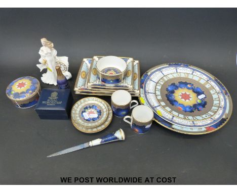 A collection of Royal Worcester Millennium items including ring box, letter knife, candle snuffer, figurine etc