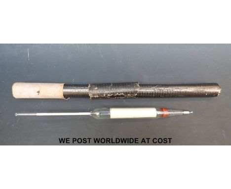 A GF-363 WW2 German Kriegsmarine U-boat hydrometer in its storage tube 