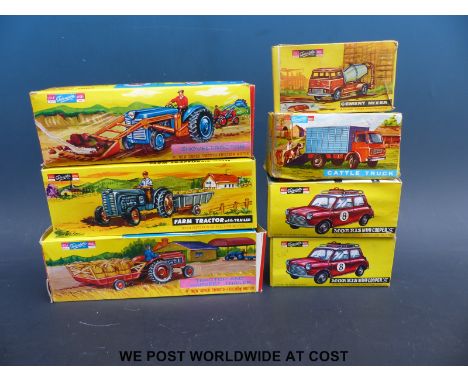 Seven Telsalda scale model friction toys, comprising Farm Tractor with Trailer, Shovel Tractor, Tractor and Harvest Trailer, 