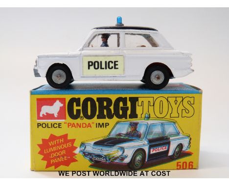 Corgi Toys diecast model Police 'Panda' Imp, 506, with white body, folding rear seats, black roof, luminous door panels and b