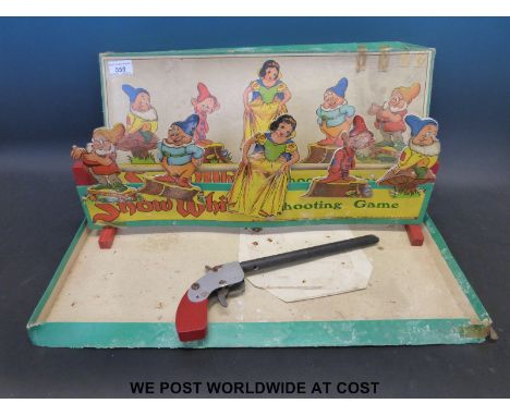 Chad Valley Snow White elastic band gun shooting gallery game, in original box