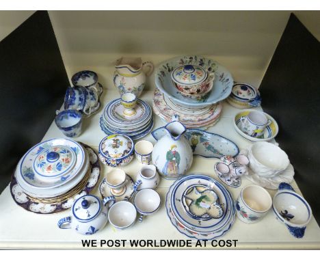 A collection of salt-glazed items to include plates, egg cups, bowls and cups, together with a parian ware cup and saucer and