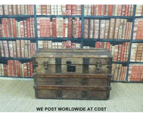 A 19thC metal and ash bound domed trunk with carrying handles (W85 D50 H57cm)