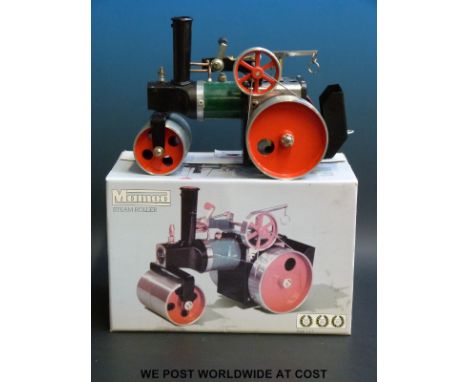 A Mamod live steam S.R.1.A steam roller with sight glass, solid fuel burner, steering rod and box
