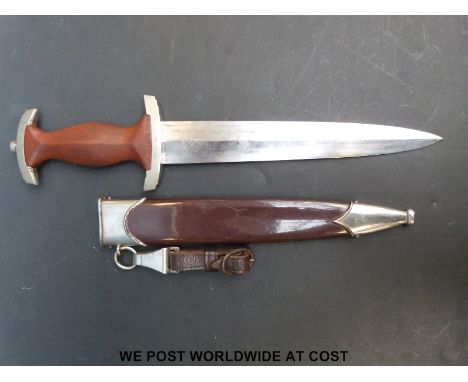 A WWII Nazi German SA dagger in scabbard with hanger and motto to blade 'Alles for Deutschland' and with maker's mark R Haast