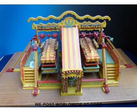 A scratch built set of fairground steam yachts with central engine and organ, approximately 1/12 scale, width approximately 1