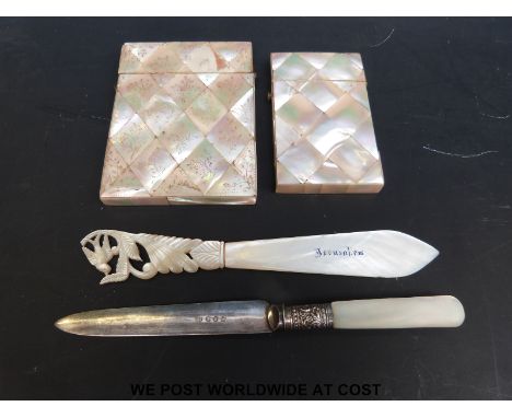 Two mother of pearl card cases, a mother of pearl handled fruit knife and a page turner marked 'Jerusalem'