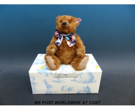 Steiff brown mohair Elvis Presley bear with jointed limbs and musical box playing Elvis songs, 30cm tall, in original box