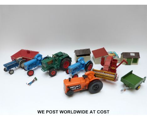 A farm layout together with stable and a large collection of farm animals including tractor shed set Blue Box, Husky, Tri-ang