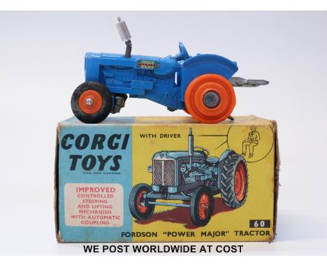Corgi Toys diecast model Fordson 'Power Major' Tractor, 60, with blue body, red plastic hubs and driver, in original box with