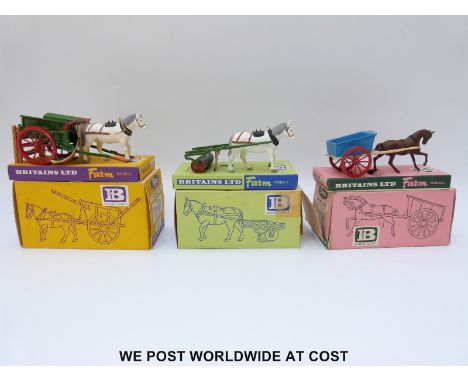 Three Britains Ltd diecast model Farm Implements, Farm Cart 9500, Farm Roller 9504 and Tumbrel Cart 9505, all in original box