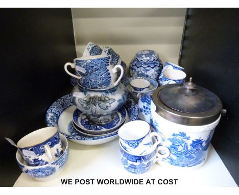 A collection of blue and white ceramics including Spode. 