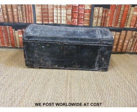 A metal bound, domed top stud work trunk with C G to lid (W77 D41 H39) 