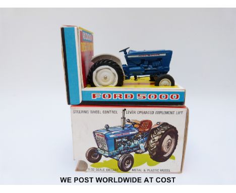 Britains Ltd diecast model Ford Super Major 5000 Diesel Tractor with blue body and white plastic hubs, in original box