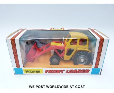 Britains Ltd model Massey-Ferguson Tractor with Front Loader, 9572, with yellow cab, red shovel and plastic rubble, in origin