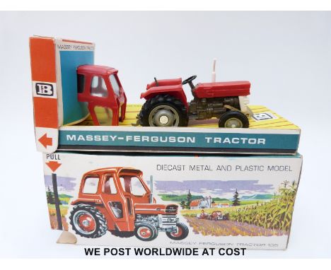 Britains Ltd diecast model Massey-Ferguson 135 Tractor with red and white body and removable safety cab, in original box with
