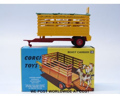 Corgi Toys diecast model Beast Carrier, 58, with yellow body, red chassis and hubs and four calves, in original box.