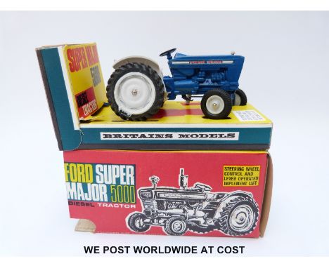 Britains Ltd diecast model Ford Super Major 5000 Diesel Tractor with blue body and white plastic hubs, in original box