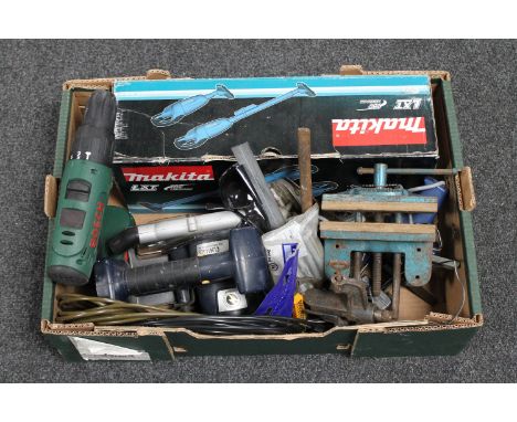 A box of Makita portable vacuum, hand tools, bench vice etc 