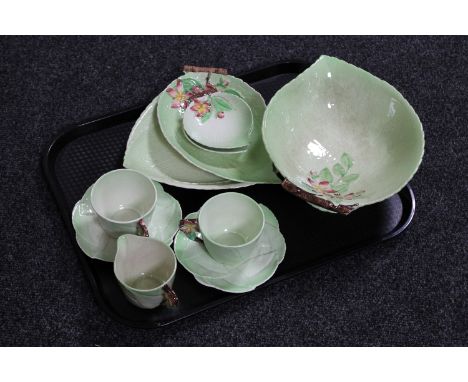 A tray of two Carlton ware cups and saucers together with a matching Carlton ware milk jug, five further pieces of Carlton ch