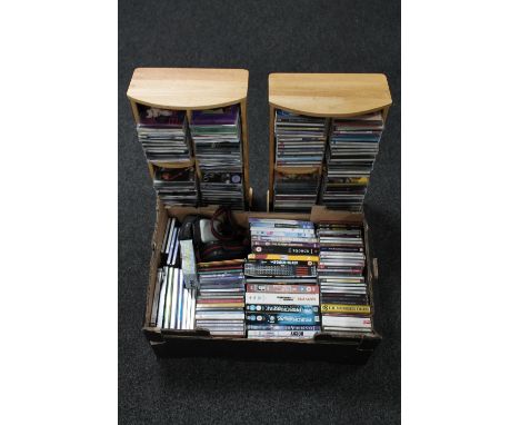 Two CD racks containing CD's and further box of CD's and DVD's, cameras etc 
