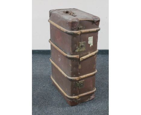 An early twentieth century wooden bound travelling trunk