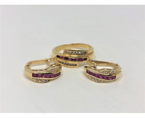 An 18ct gold diamond and ruby set ring, size R, with matching set of earrings 