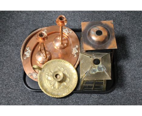 A tray of Art Nouveau copper tray, candlesticks, brass embossed candle holder together with two light shades 