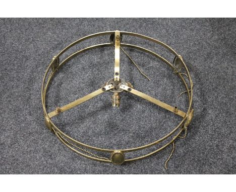 A brass Art Nouveau light fitting 