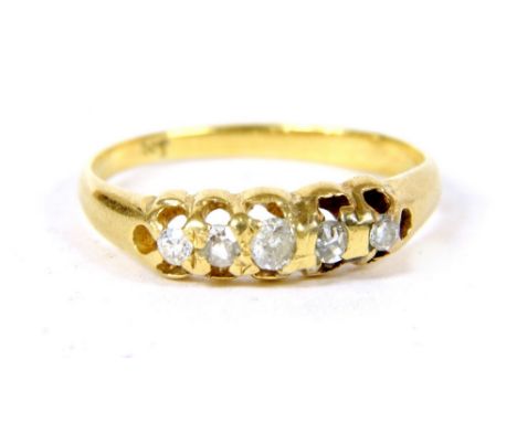A gold five stone graduated diamond ring, marked 9ct, 1.81g