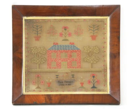 A Victorian needlework sampler, with central brick house by Merle(?) Parkinson aged 14 18??m 40 x 43cm, framed