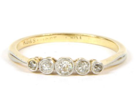 A gold five stone graduated diamond ring, marked 9ct and PLAT, size O, 2.12g