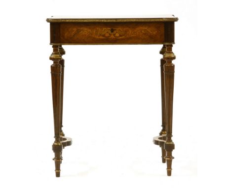 A French Rosewood and inlaid work table , the grater veneered top with outswept ring turned and reeded supports, the top lift