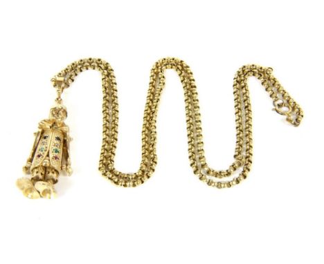 A 9ct gold gem set clown pendant, suspended on a belcher chain, 23.31g