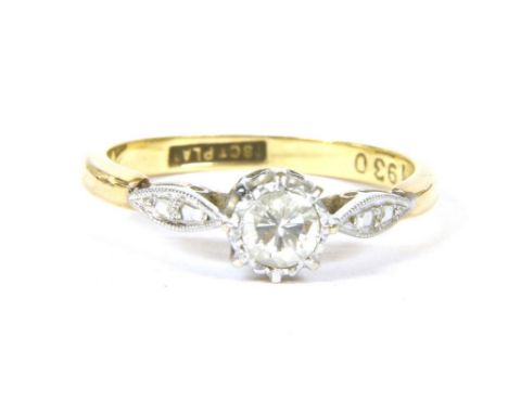 A gold single stone illusion set diamond ring, marked 18ct PLAT, 2.73g, size K½