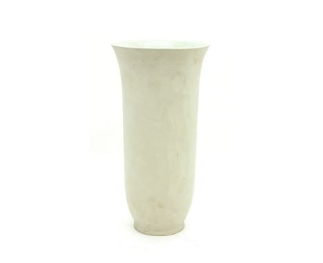 A Berlin white ceramic vase, of tulip form, engraved with a figure, faint marks, 33.5cm high