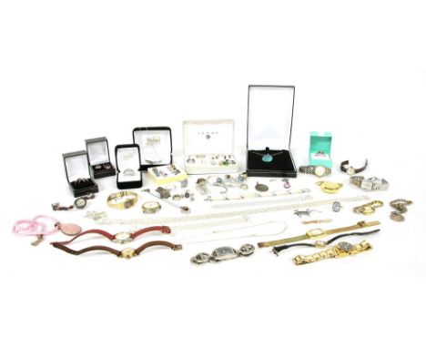 A large quantity of silver and costume jewellery, including a silver single stone cubic zirconia ring, a pair of silver green