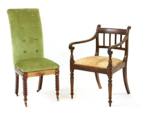 An early 19th century mahogany elbow chair, with scrolling arms and ring turned supports, together with a button back chair o