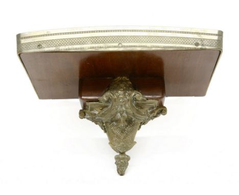 A Continental mahogany and gilt metal mounted wall bracket, 33cm wide, 20cm deep, 15cm high