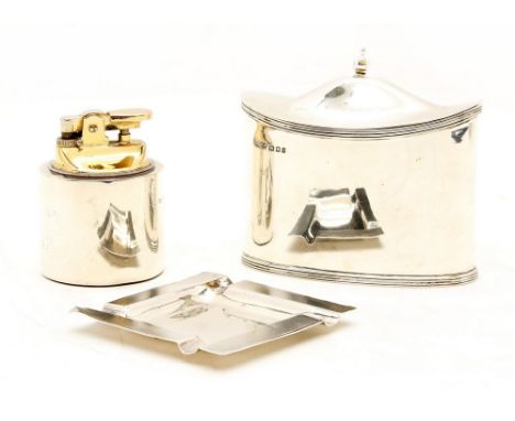 A silver tea caddy of navette form, with triple reeded rim and foot, London 1923, approximately 5 ozt, together with a silver