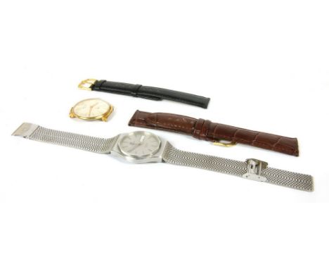 A gentlemen's stainless steel Tissot Seastar quartz bracelet watch, and a gentlemen's gold plated Rotary mechanical watch hea